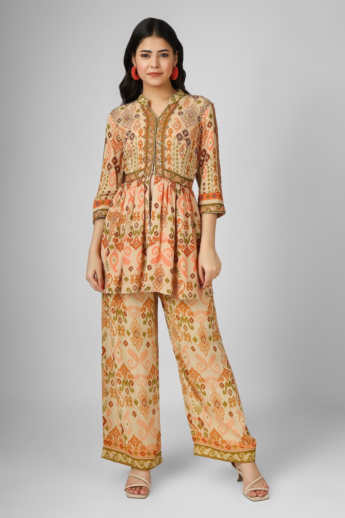 Beige Silk Georgette Printed Ikat Notched Peplum Top And Pant Set For Women